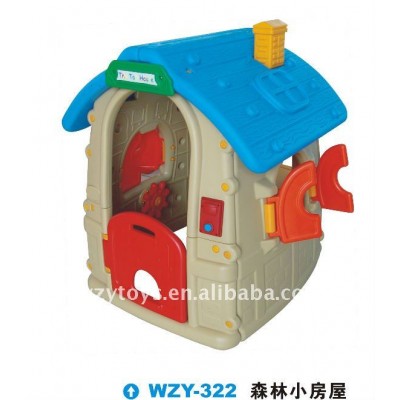 Children's plastic playhouse in home garden